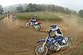 Motocross riders do it round the bend